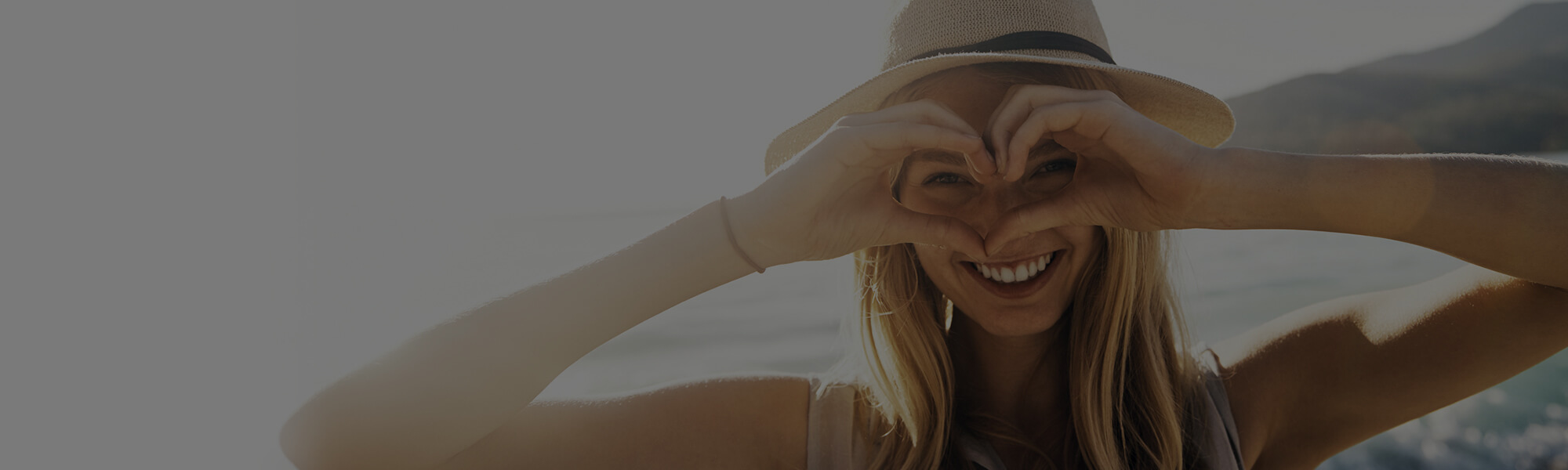 women covering her eyes with hands